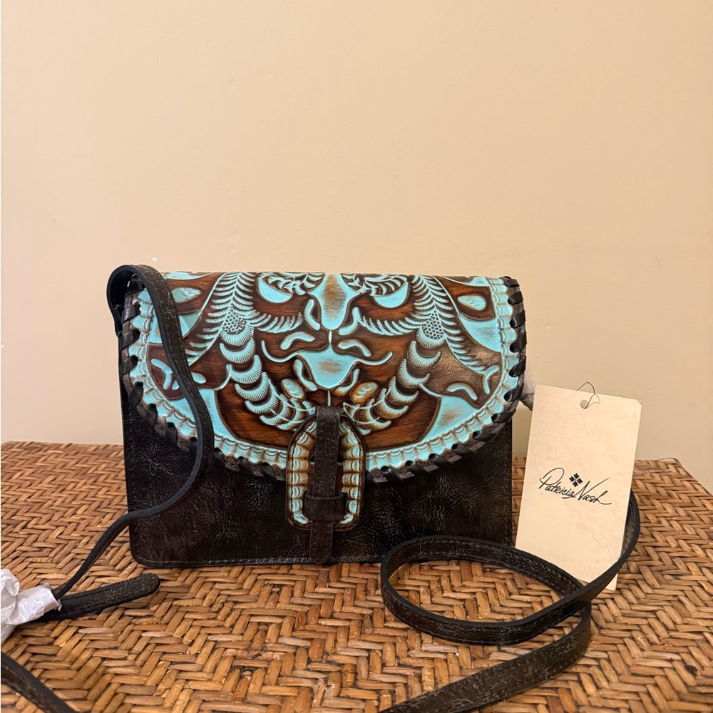Patricia Nash Lanza Crossbody
Tooled Turquoise Leather Crossbody bag NWT